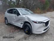 ✅ 2025 Mazda CX-5 S Preferred • VIN: JM3KFBCL7S0616779 • Лот: 92164005. Опубликован ранее на Copart с пробегом 13 582 миль. Бесплатный доступ к архиву аукционных продаж из США и подробный отчёт об истории автомобиля на DreamBid. Изображение 4.