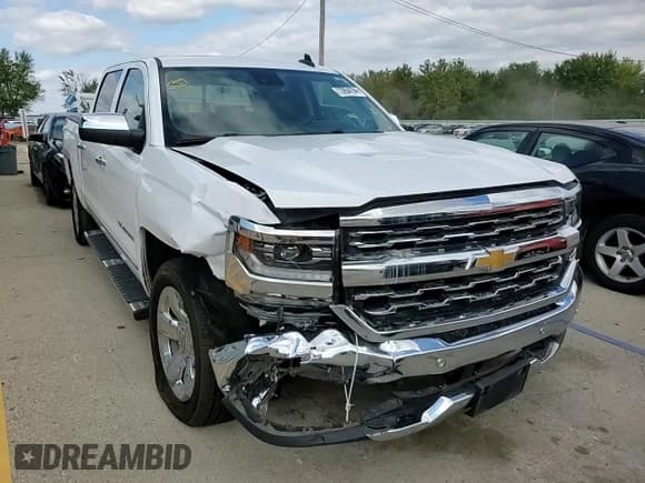 ✅ 2018 Chevrolet Silverado 1500 LTZ • VIN: 3GCUKSEC0JG647716 • Лот: 73954704. Опубликован ранее на Copart с пробегом 71 842 миль. Бесплатный доступ к архиву аукционных продаж из США и подробный отчёт об истории автомобиля на DreamBid. Изображение 13.