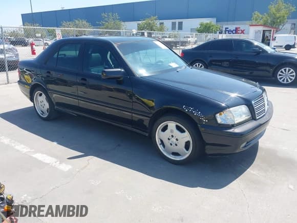 ✅ 1999 Mercedes-Benz C • VIN: WDBHA33G3XF889442 • Lot: 42403800. Listed on IAAI with 82,075 mi. Free auction sales archive from the USA and detailed vehicle history report at DreamBid. Image 1.
