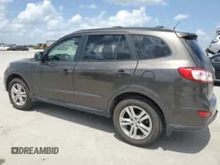 2012 Hyundai Santa Fe SE с VIN 5XYZHDAG2CG120223, выставлен на аукционе Copart как лот 63276544 с пробегом 113 300 миль миль и Чистый • Clean title. История ставок и продаж доступна на DreamBid. Изображение 2.