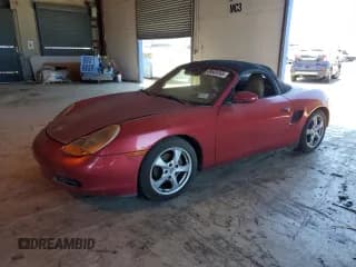✅ 2001 Porsche Boxster • VIN: WP0CA29821U625928 • Lot: 69509165. Listed on Copart with 122,894 mi. Free auction sales archive from the USA and detailed vehicle history report at DreamBid. Image 1.