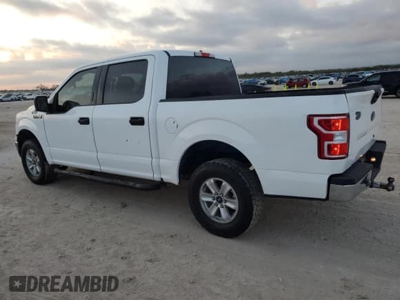 ✅ 2018 Ford F-150 Lariat • VIN: 1FTEW1E50JKE18031 • Lot: 89826085. Listed on Copart with 84,743 mi. Free auction sales archive from the USA and detailed vehicle history report at DreamBid. Image 2.