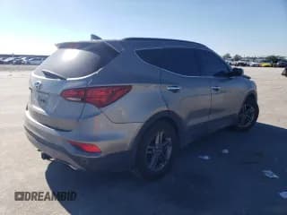 ✅ 2017 Hyundai Santa Fe 2.4L • VIN: 5XYZU3LB5HG422829 • Лот: 43413654. Опубликован ранее на Copart с пробегом 128 799 миль. Бесплатный доступ к архиву аукционных продаж из США и подробный отчёт об истории автомобиля на DreamBid. Изображение 3.