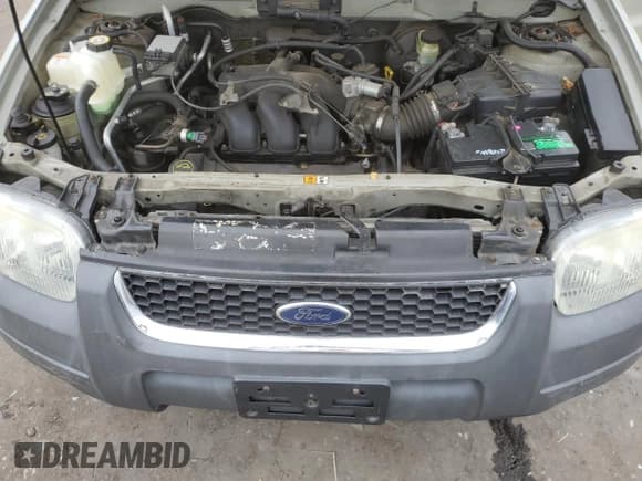 ✅ 2003 Ford Escape XLT Popular 2 • VIN: 1FMYU93173KB79464 • Lot: 67105015. Wystawiony na Copart z przebiegiem 87 593 mil. Bezpłatny archiwum sprzedaży aukcyjnych z USA i szczegółowy raport historii pojazdu na DreamBid. Zdjęcie 12.