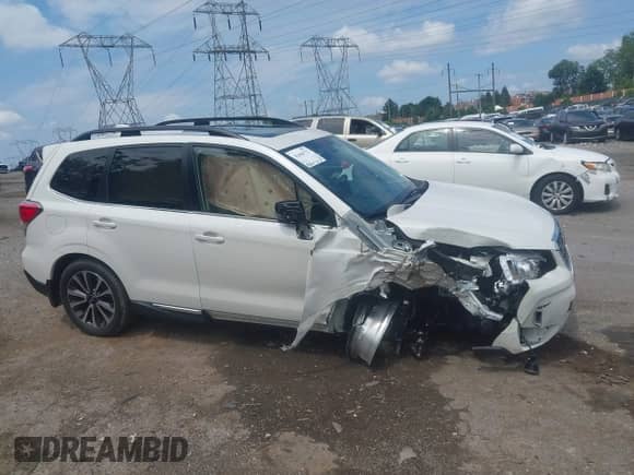 2018 Subaru Forester Touring z VIN JF2SJGWC3JH607000, wystawiony jako IAAI lot #42664722 z przebiegiem 30 857 mil mil oraz . Historia ofert i sprzedaży dostępna na DreamBid. Obrazek 17.