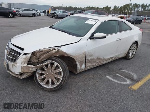 ✅ 2015 Cadillac ATS Standard AWD • VIN: 1G6AG1RX0F0127073 • Lot: 41296448. Listed on IAAI with 119,718 mi. Free auction sales archive from the USA and detailed vehicle history report at DreamBid. Image 2.