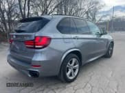 ✅ 2015 BMW X5 xDrive50i • VIN: 5UXKR6C50F0J76918 • Lot: 48632265. Listed on Copart with 141,000 mi. Free auction sales archive from the USA and detailed vehicle history report at DreamBid. Image 4.