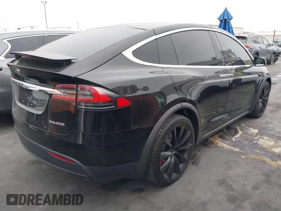 ✅ 2021 Tesla Model X Performance • VIN: 5YJXCBE46MF322680 • Lot: 43535693. Listed on IAAI with 52,241 mi. Free auction sales archive from the USA and detailed vehicle history report at DreamBid. Image 4.