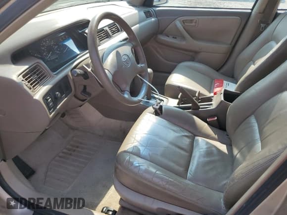 ✅ 1997 Toyota Camry LE • VIN: JT2BF22K4V0074975 • Lot: 83843615. Wystawiony na Copart z przebiegiem 254 354 mil. Bezpłatny archiwum sprzedaży aukcyjnych z USA i szczegółowy raport historii pojazdu na DreamBid. Zdjęcie 7.