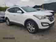 2013 Hyundai Santa Fe Sport with VIN 5XYZUDLA8DG083331, listed as a Copart auction lot 90703965 with 108,650 mi miles and Clean title. Bid and sale history available at DreamBid. Image 4.