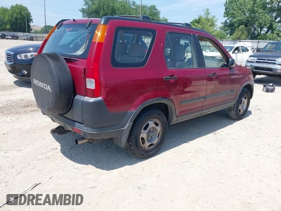 ✅ 2004 Honda CR-V LX • VIN: JHLRD785X4C056149 • Lot: 42797487. Listed on IAAI with 235,000 mi. Free auction sales archive from the USA and detailed vehicle history report at DreamBid. Image 4.