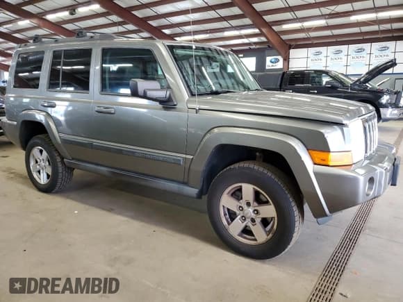 ✅ 2007 Jeep Commander Sport • VIN: 1J8HG48N77C573999 • Lot: 61417065. Listed on Copart with 183,821 mi. Free auction sales archive from the USA and detailed vehicle history report at DreamBid. Image 4.