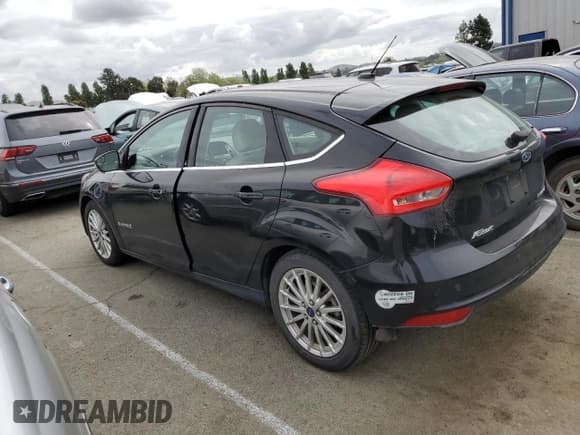 ✅ 2015 Ford Focus Electric • VIN: 1FADP3R41FL232463 • Lot: 51962274. Listed on Copart with 83,379 mi. Free auction sales archive from the USA and detailed vehicle history report at DreamBid. Image 2.