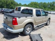 ✅ 2003 Ford Explorer Sport Trac XLS • VIN: 1FMZU77E23UC28404 • Lot: 42693701. Listed on IAAI with 120,435 mi. Free auction sales archive from the USA and detailed vehicle history report at DreamBid. Image 4.