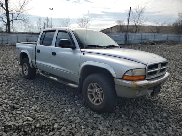 ✅ 2004 Dodge Dakota SLT • VIN: 1D7HG48NX4S677465 • Lot: 51044735. Wystawiony na Copart z przebiegiem 196 854 mil. Bezpłatny archiwum sprzedaży aukcyjnych z USA i szczegółowy raport historii pojazdu na DreamBid. Zdjęcie 4.