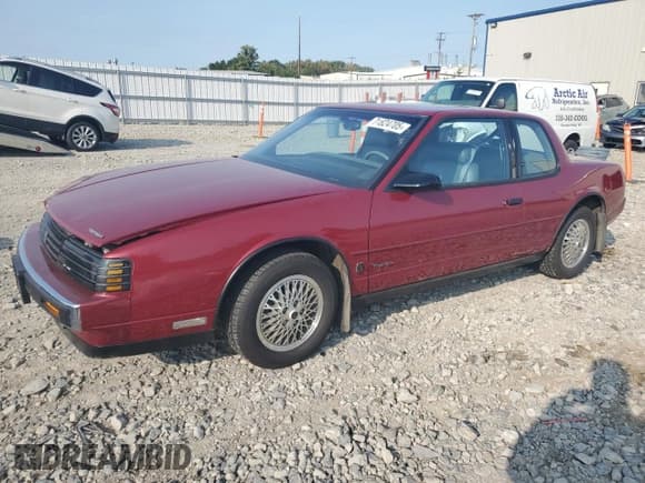 ✅ 1987 Oldsmobile Toronado • VIN: 1G3EZ1134HU308058 • Lot: 71824705. Wystawiony na Copart z przebiegiem 48 163 mil. Bezpłatny archiwum sprzedaży aukcyjnych z USA i szczegółowy raport historii pojazdu na DreamBid. Zdjęcie 1.
