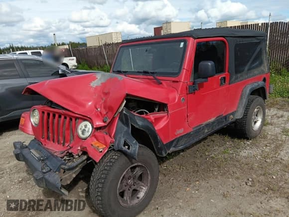 ✅ 2005 Jeep Wrangler Unlimited • VIN: 1J4FA44S15P312587 • Lot: 68176985. Listed on Copart with 186,612 mi. Free auction sales archive from the USA and detailed vehicle history report at DreamBid. Image 1.