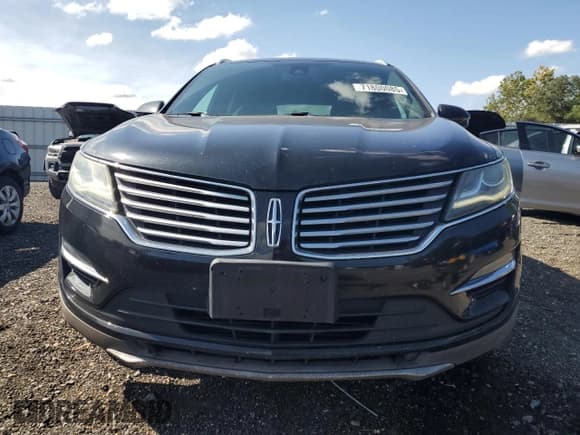 ✅ 2015 Lincoln MKC • VIN: 5LMCJ2A92FUJ08567 • Lot: 71800085. Listed on Copart with 136,715 mi. Free auction sales archive from the USA and detailed vehicle history report at DreamBid. Image 5.
