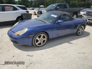 ✅ 2000 Porsche Boxster • VIN: WP0CA2984YU623818 • Lot: 71554785. Listed on Copart with 193,382 mi. Free auction sales archive from the USA and detailed vehicle history report at DreamBid. Image 1.