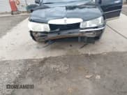 ✅ 2001 Lincoln Town Car Signature • VIN: 1LNHM82W91Y658583 • Lot: 43680843. Wystawiony na IAAI z przebiegiem 98 445 mil. Bezpłatny archiwum sprzedaży aukcyjnych z USA i szczegółowy raport historii pojazdu na DreamBid. Zdjęcie 6.