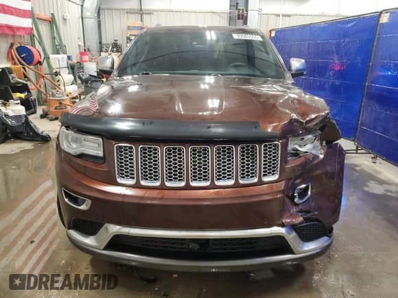 ✅ 2014 Jeep Grand Cherokee Summit • VIN: 1C4RJFJT6EC276110 • Lot: 90085555. Listed on Copart with 266,904 mi. Free auction sales archive from the USA and detailed vehicle history report at DreamBid. Image 5.