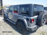 ✅ 2021 Jeep Wrangler Unlimited Sport Altitude • VIN: 1C4HJXDGXMW662493 • Lot: 41288957. Wystawiony na IAAI z przebiegiem 64 808 mil. Bezpłatny archiwum sprzedaży aukcyjnych z USA i szczegółowy raport historii pojazdu na DreamBid. Zdjęcie 3.