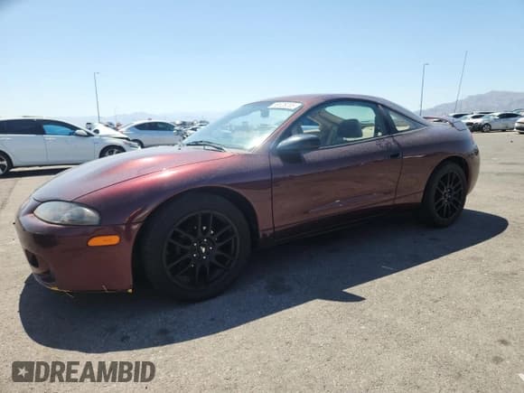 ✅ 1999 Mitsubishi Eclipse RS • VIN: 4A3AK34Y5XE023302 • Лот: 58626205. Опубликован ранее на Copart с пробегом 79 167 миль. Бесплатный доступ к архиву аукционных продаж из США и подробный отчёт об истории автомобиля на DreamBid. Изображение 1.