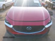 ✅ 2022 Mazda CX-30 S Carbon Edition • VIN: 3MVDMBCL4NM431242 • Lot: 41851636. Listed on IAAI with 40,982 mi. Free auction sales archive from the USA and detailed vehicle history report at DreamBid. Image 12.