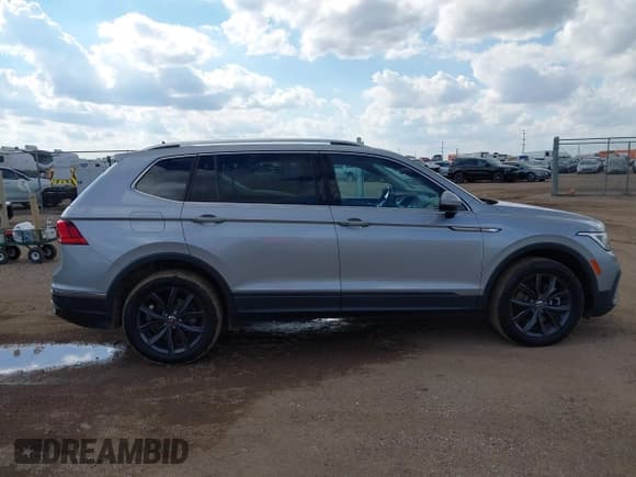 ✅ 2022 Volkswagen Tiguan SE • VIN: 3VV3B7AX3NM008210 • Lot: 43268190. Listed on IAAI with 60,448 mi. Free auction sales archive from the USA and detailed vehicle history report at DreamBid. Image 13.