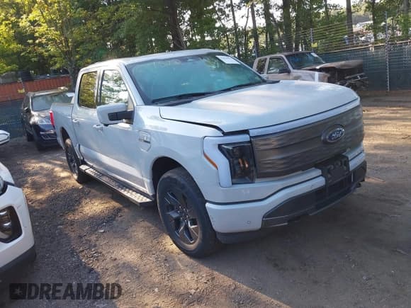 ✅ 2023 Ford F-150 Lightning Pro • VIN: 1FT6W1EV3PWG54808 • Lot: 43036931. Listed on IAAI with 42,398 mi. Free auction sales archive from the USA and detailed vehicle history report at DreamBid. Image 1.
