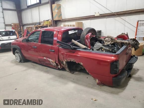 2008 Dodge Dakota z VIN 1D7HW38N38S535025, wystawiony jako Copart lot #77204754 z przebiegiem 245 225 mil mil oraz Szkoda całkowita • Salvage title. Historia ofert i sprzedaży dostępna na DreamBid. Obrazek 2.