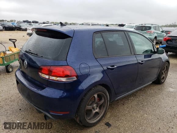 ✅ 2012 Volkswagen Golf GTI w/Sunroof & Navi • VIN: WVWHV7AJ7CW262152 • Lot: 71866903. Wystawiony na Copart z przebiegiem 104 323 mil. Bezpłatny archiwum sprzedaży aukcyjnych z USA i szczegółowy raport historii pojazdu na DreamBid. Zdjęcie 3.