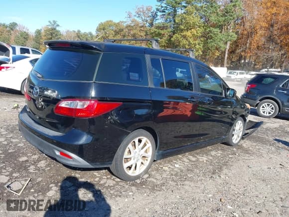 ✅ 2012 Mazda 5 Grand Touring • VIN: JM1CW2DL3C0128331 • Лот: 43656010. Опубликован ранее на IAAI с пробегом 169 514 миль. Бесплатный доступ к архиву аукционных продаж из США и подробный отчёт об истории автомобиля на DreamBid. Изображение 4.