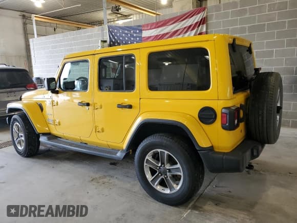✅ 2019 Jeep Wrangler Unlimited Sahara • VIN: 1C4HJXEN0KW625558 • Лот: 81084865. Опубликован ранее на Copart с пробегом 129 282 миль. Бесплатный доступ к архиву аукционных продаж из США и подробный отчёт об истории автомобиля на DreamBid. Изображение 2.