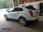 ✅ 2016 Cadillac SRX Premium Collection • VIN: 3GYFNDE34GS552894 • Lot: 64945985. Listed on Copart with 105,751 mi. Free auction sales archive from the USA and detailed vehicle history report at DreamBid. Image 2.