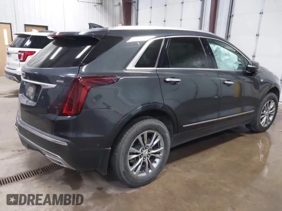 ✅ 2023 Cadillac XT5 AWD Premium Luxury • VIN: 1GYKNDRS2PZ122350 • Lot: 42123718. Listed on IAAI with 17,971 mi. Free auction sales archive from the USA and detailed vehicle history report at DreamBid. Image 4.