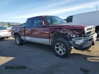 2001 Dodge 1500 с VIN 3B7HC12Z61G182411, выставлен на аукционе Copart как лот 86776554 с пробегом 184 098 миль миль и Списание • Salvage title. История ставок и продаж доступна на DreamBid. Изображение 4.