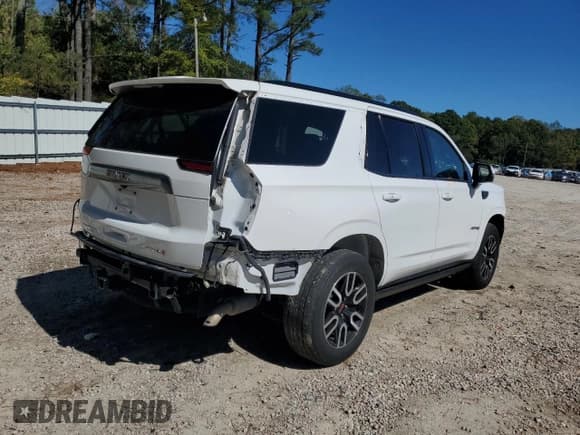 ✅ 2021 GMC Yukon AT4 • VIN: 1GKS2CKD7MR351174 • Lot: 82259975. Listed on Copart with 102,613 mi. Free auction sales archive from the USA and detailed vehicle history report at DreamBid. Image 3.