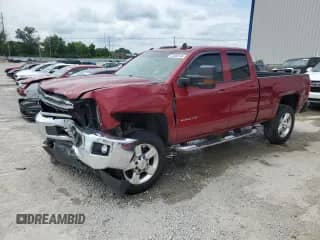 2019 Chevrolet Silverado 2500HD LT with VIN 2GC2KSEG4K1169918, listed as a Copart auction lot 57660145 with 83,079 mi miles and Salvage title. Bid and sale history available at DreamBid. Image 1.