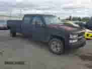 1997 Chevrolet Silverado 3500 with VIN 1GCHC33J3VF052789, listed as a Copart auction lot 86842835 with 137,985 mi miles and Salvage title. Bid and sale history available at DreamBid. Image 4.