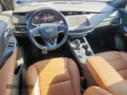 ✅ 2022 Cadillac XT4 AWD Premium Luxury • VIN: 1GYFZDR4XNF153562 • Лот: 61836005. Опубликован ранее на Copart с пробегом 33 091 миль. Бесплатный доступ к архиву аукционных продаж из США и подробный отчёт об истории автомобиля на DreamBid. Изображение 8.