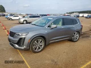 ✅ 2021 Cadillac XT6 Premium Luxury • VIN: 1GYKPCRS6MZ161734 • Lot: 92679725. Listed on Copart with 37,678 mi. Free auction sales archive from the USA and detailed vehicle history report at DreamBid. Image 1.