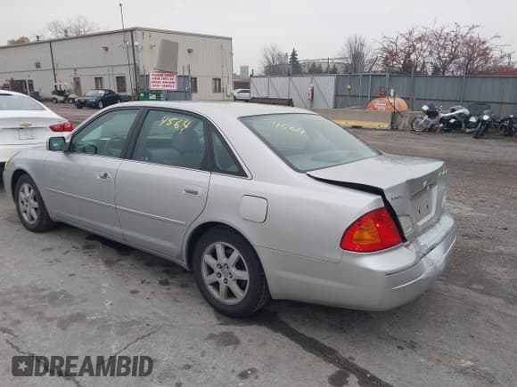 ✅ 2000 Toyota Avalon XL • VIN: 4T1BF28BXYU099306 • Lot: 43734564. Listed on IAAI with 103,566 mi. Free auction sales archive from the USA and detailed vehicle history report at DreamBid. Image 3.