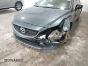 ✅ 2014 Mazda 6 i Grand Touring • VIN: JM1GJ1W67E1159404 • Lot: 42702402. Listed on IAAI with 107,039 mi. Free auction sales archive from the USA and detailed vehicle history report at DreamBid. Image 6.