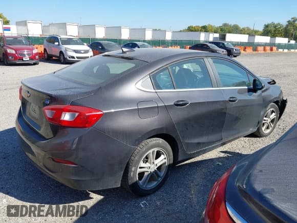 ✅ 2017 Chevrolet Cruze LT • VIN: 1G1BH5SE8H7229772 • Lot: 43474284. Listed on IAAI with 104,164 mi. Free auction sales archive from the USA and detailed vehicle history report at DreamBid. Image 4.