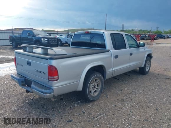 ✅ 2004 Dodge Dakota Sport • VIN: 1D7HL38N24S781597 • Lot: 42438612. Wystawiony na IAAI z przebiegiem 128 123 mil. Bezpłatny archiwum sprzedaży aukcyjnych z USA i szczegółowy raport historii pojazdu na DreamBid. Zdjęcie 4.
