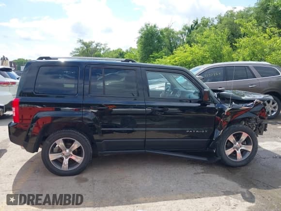 ✅ 2016 Jeep Patriot High Altitude • VIN: 1C4NJRFB0GD522971 • Lot: 42376337. Listed on IAAI with 131,946 mi. Free auction sales archive from the USA and detailed vehicle history report at DreamBid. Image 14.