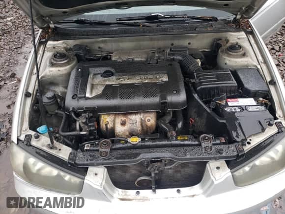 2003 Hyundai Elantra GLS z VIN KMHDN45D23U505391, wystawiony jako Copart lot #52038974 z przebiegiem 85 562 mil mil oraz Czysty tytuł • Clean title. Historia ofert i sprzedaży dostępna na DreamBid. Obrazek 11.