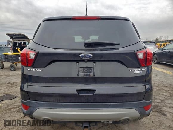 ✅ 2019 Ford Escape Titanium • VIN: 1FMCU9J92KUA49310 • Lot: 94258065. Listed on Copart with 40,827 mi. Free auction sales archive from the USA and detailed vehicle history report at DreamBid. Image 6.