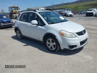✅ 2012 Suzuki SX4 Crossover • VIN: JS2YB5A35C6308615 • Лот: 42090449. Опубликован ранее на IAAI с пробегом 173 000 миль. Бесплатный доступ к архиву аукционных продаж из США и подробный отчёт об истории автомобиля на DreamBid. Изображение 1.